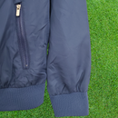 Cortavientos azul/amarillo de Brasil 