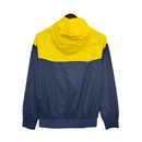 Cortavientos azul/amarillo de Brasil 